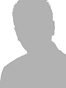 Das Bild zeigt die Silhouette einer Person mit unscharfem Hintergrund. Die Details des Gesichts und der Kleidung sind nicht erkennbar. Es handelt sich um eine schemenhafte Darstellung ohne spezifische Merkmale.